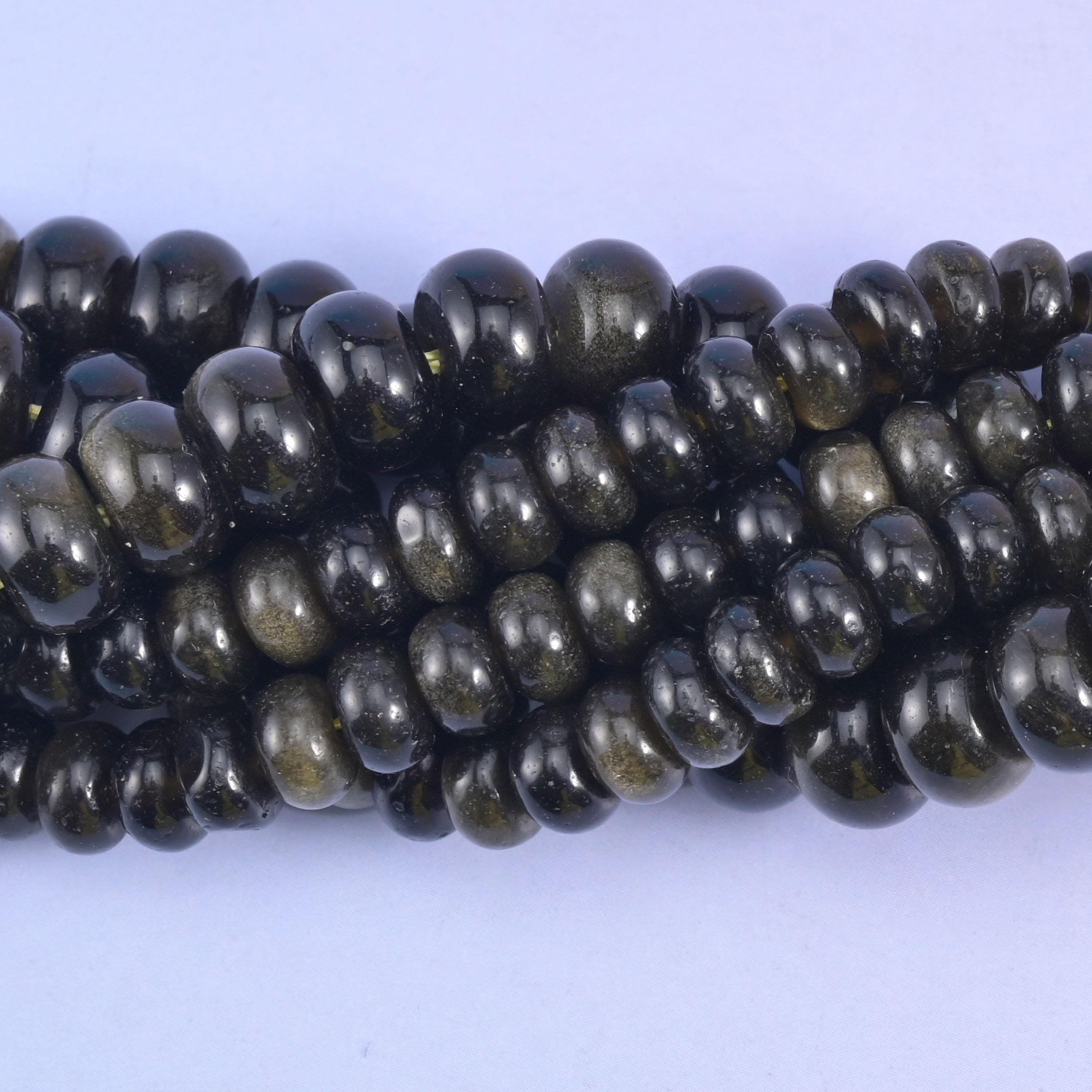 Rondelle cut Gold Obsidian beads with a smooth polished finish