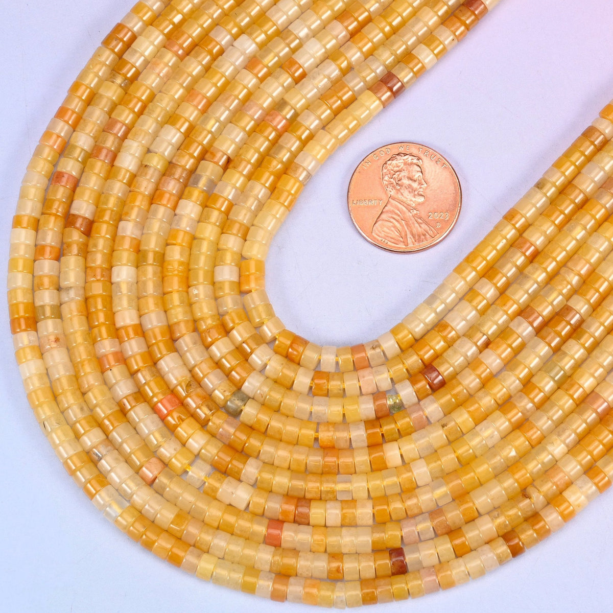 Smooth heishi disc cut Yellow Jade beads