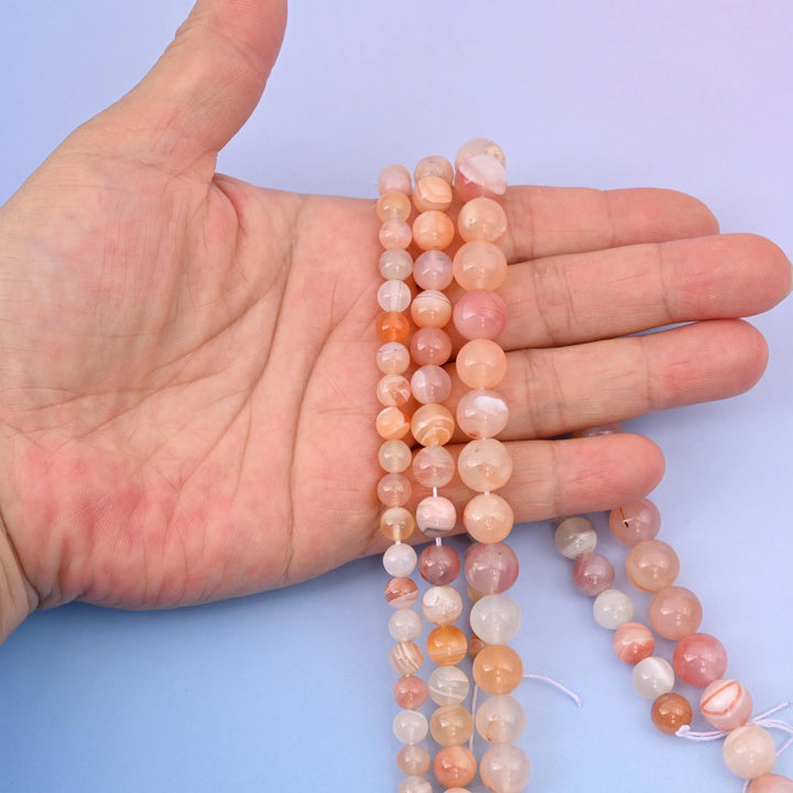 Pink Botswana Agate beads, round, 6mm to 10mm