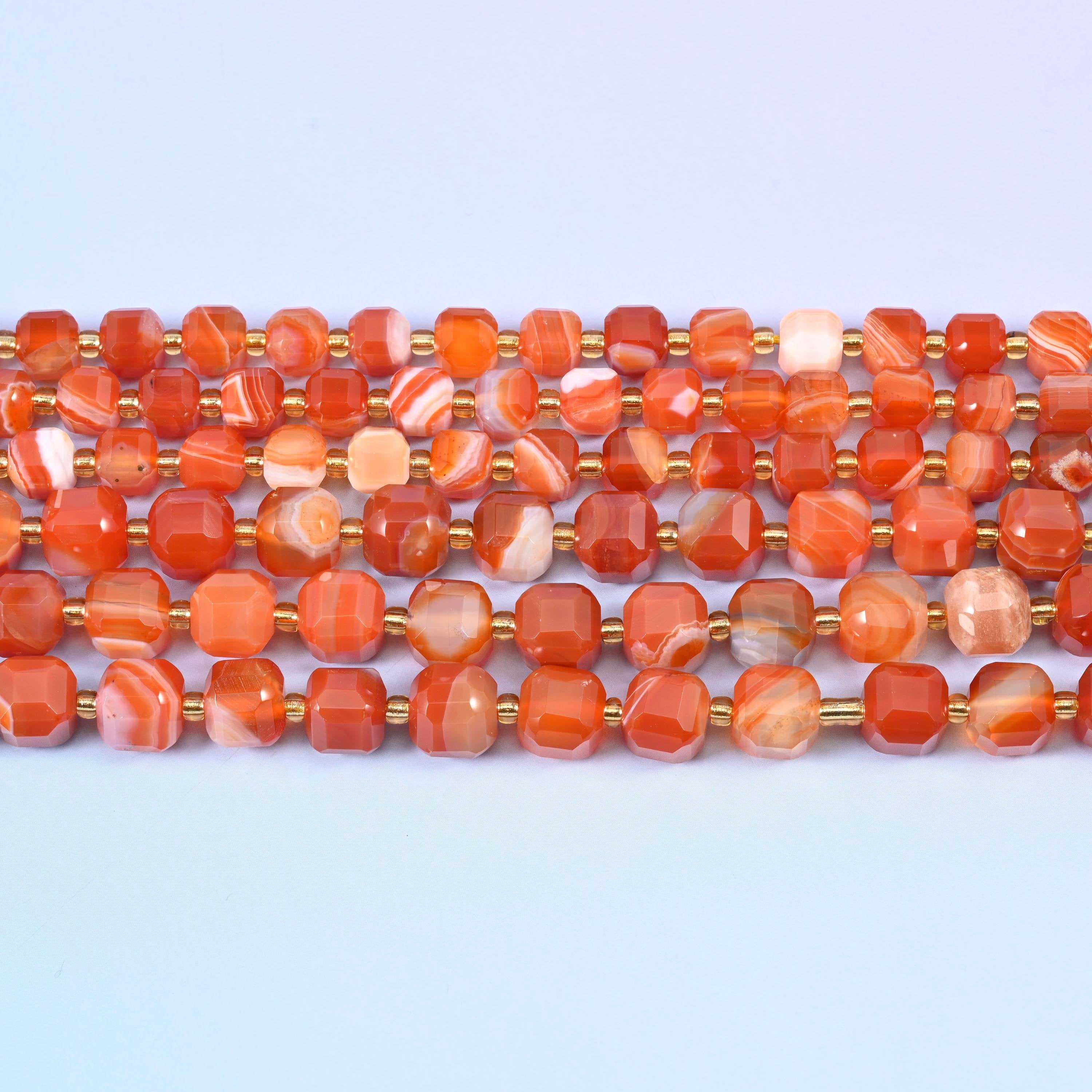 Dyed Red Stripe Agate Faceted Cube Beads in warm brick and tomato red with cream stripes