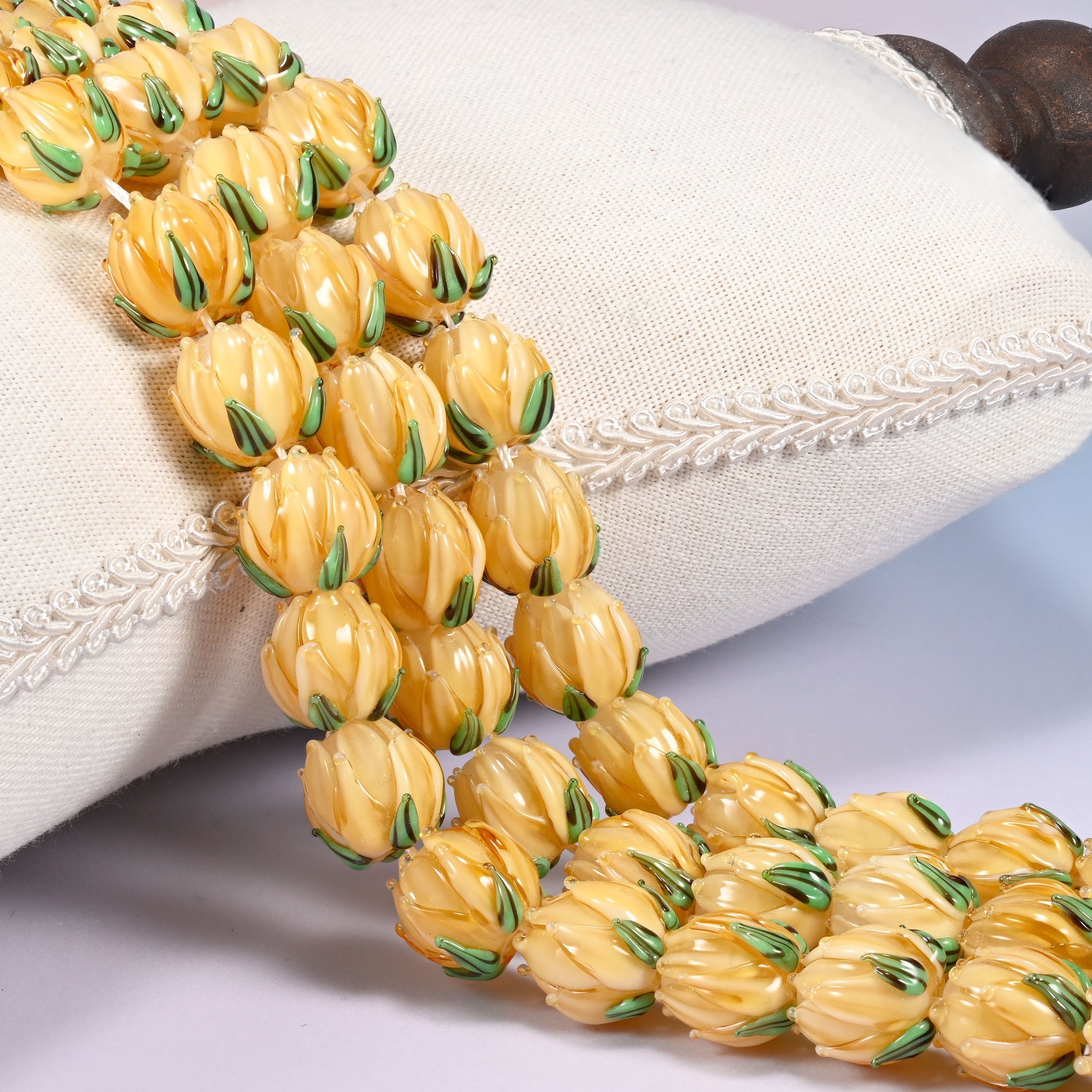 Creamy yellow tulip bud-shaped lampwork glass beads