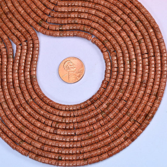 Gold Sandstone Smooth Heishi Disc Beads, approximately 180 beads per strand