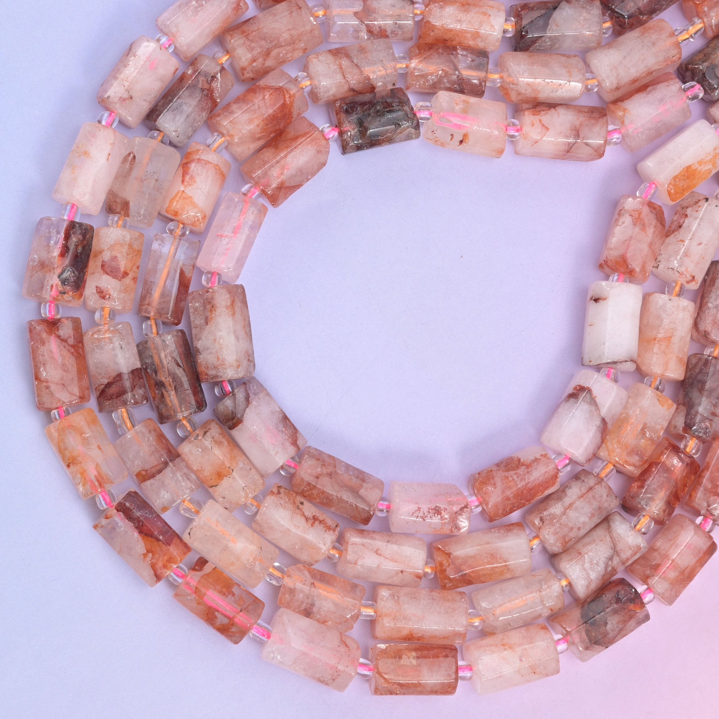 Red Hematoid Faceted Tube Beads, approximately 28 beads per strand