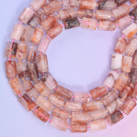 Red Hematoid Faceted Tube Beads, approximately 28 beads per strand