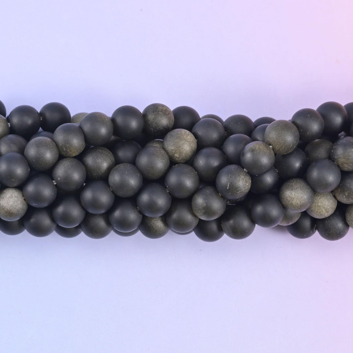 Matte round cut gold obsidian beads