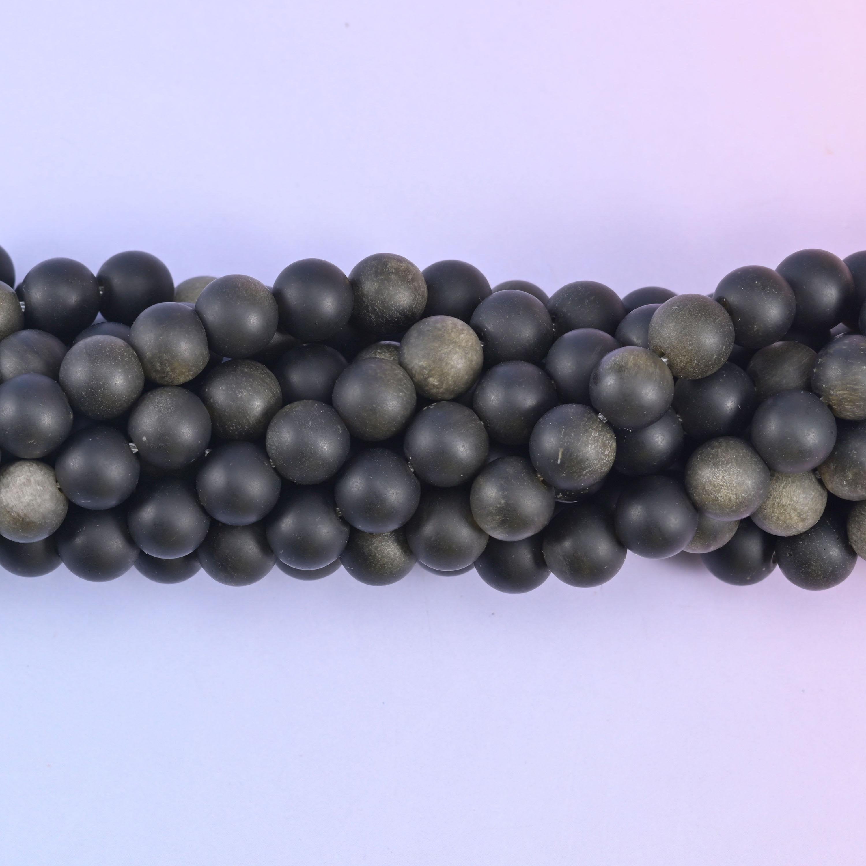 Matte round cut gold obsidian beads