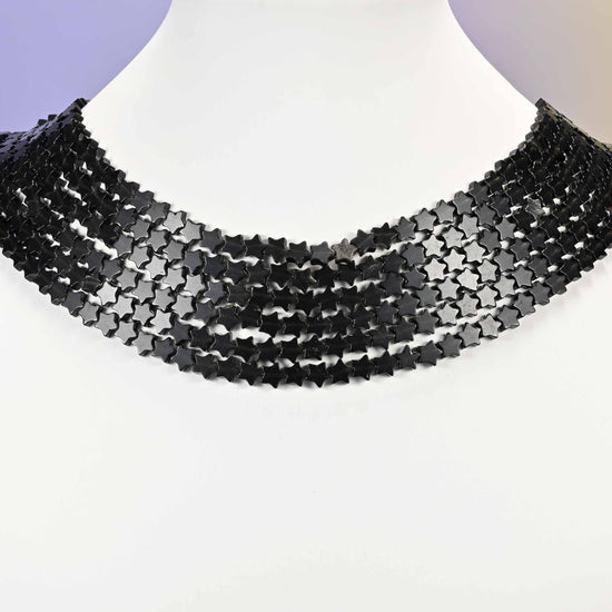 Black Obsidian beads, flat five-pointed star, Approximately 6 x 6mm, with slight variation bead to bead