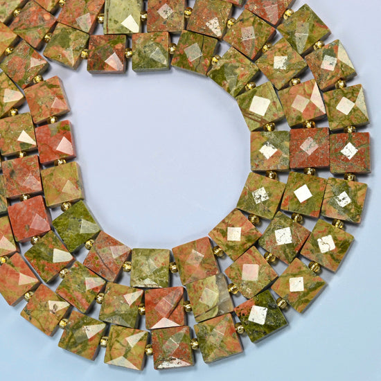 Natural unakite faceted flat square beads curved into an open loop, olive green and salmon pink beads