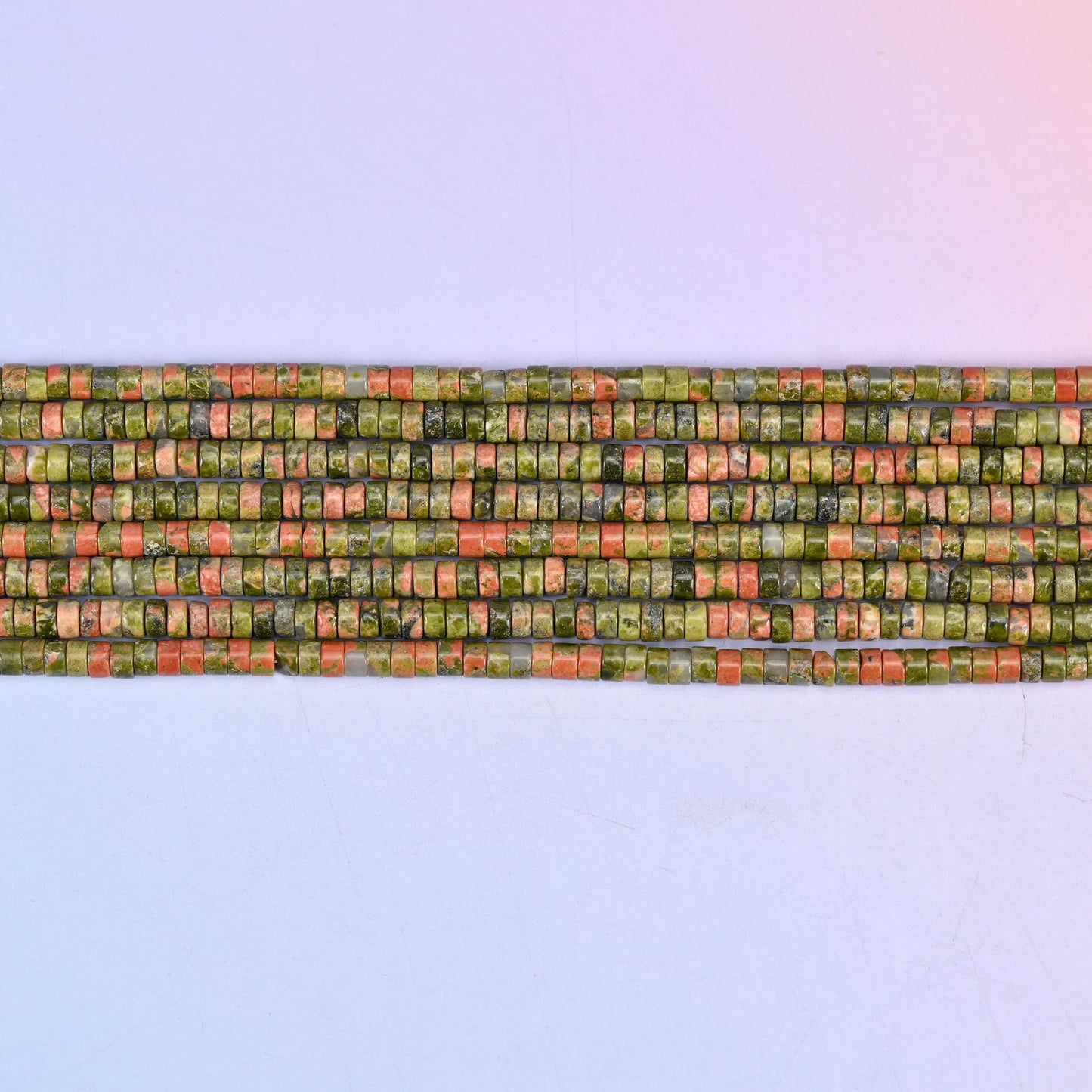 Unakite heishi beads in moss green and salmon pink