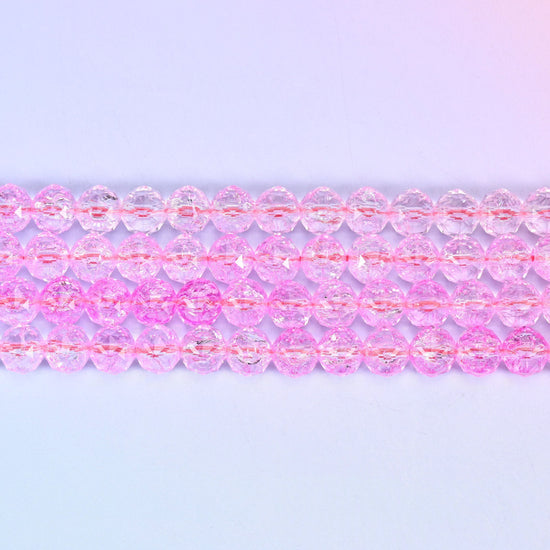 Transparent pink faceted round glass beads in clear bubblegum pink