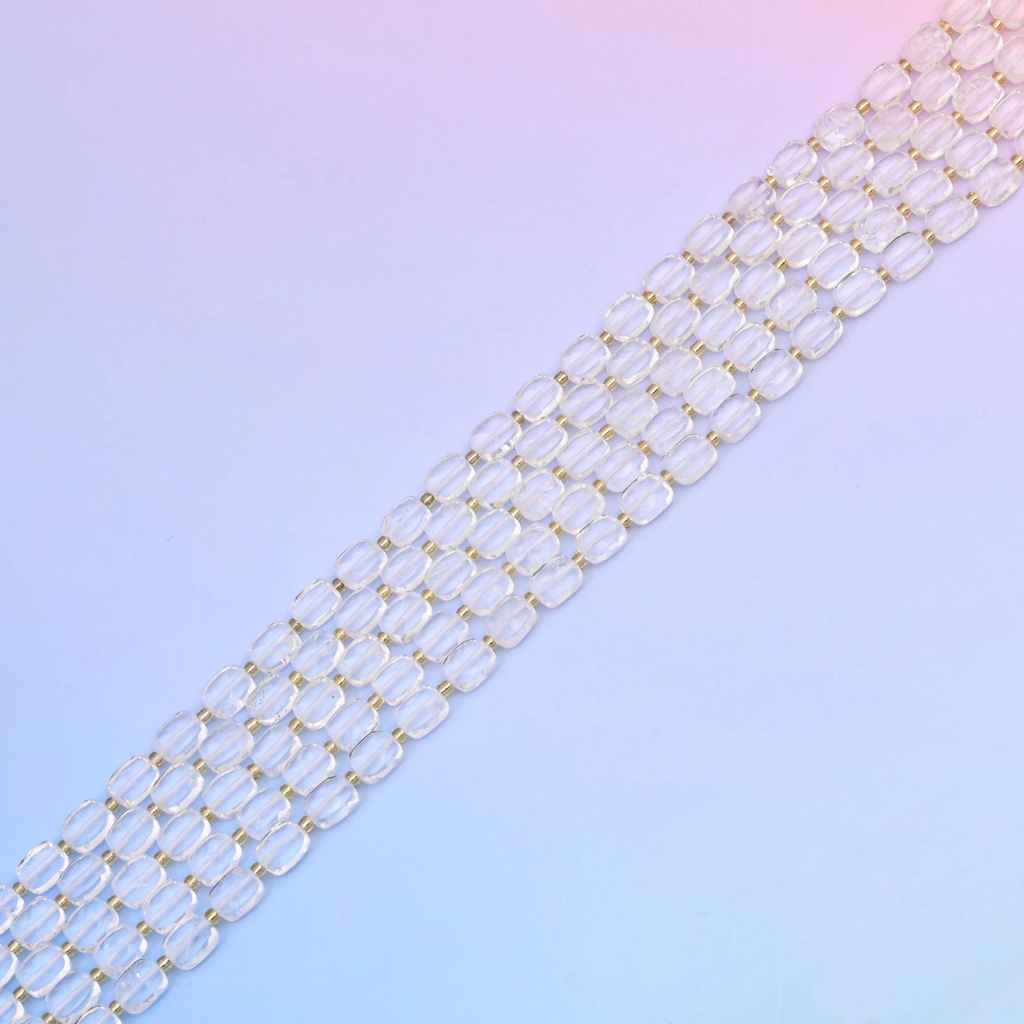 Clear quartz beads, almost water-clear and glass-bright