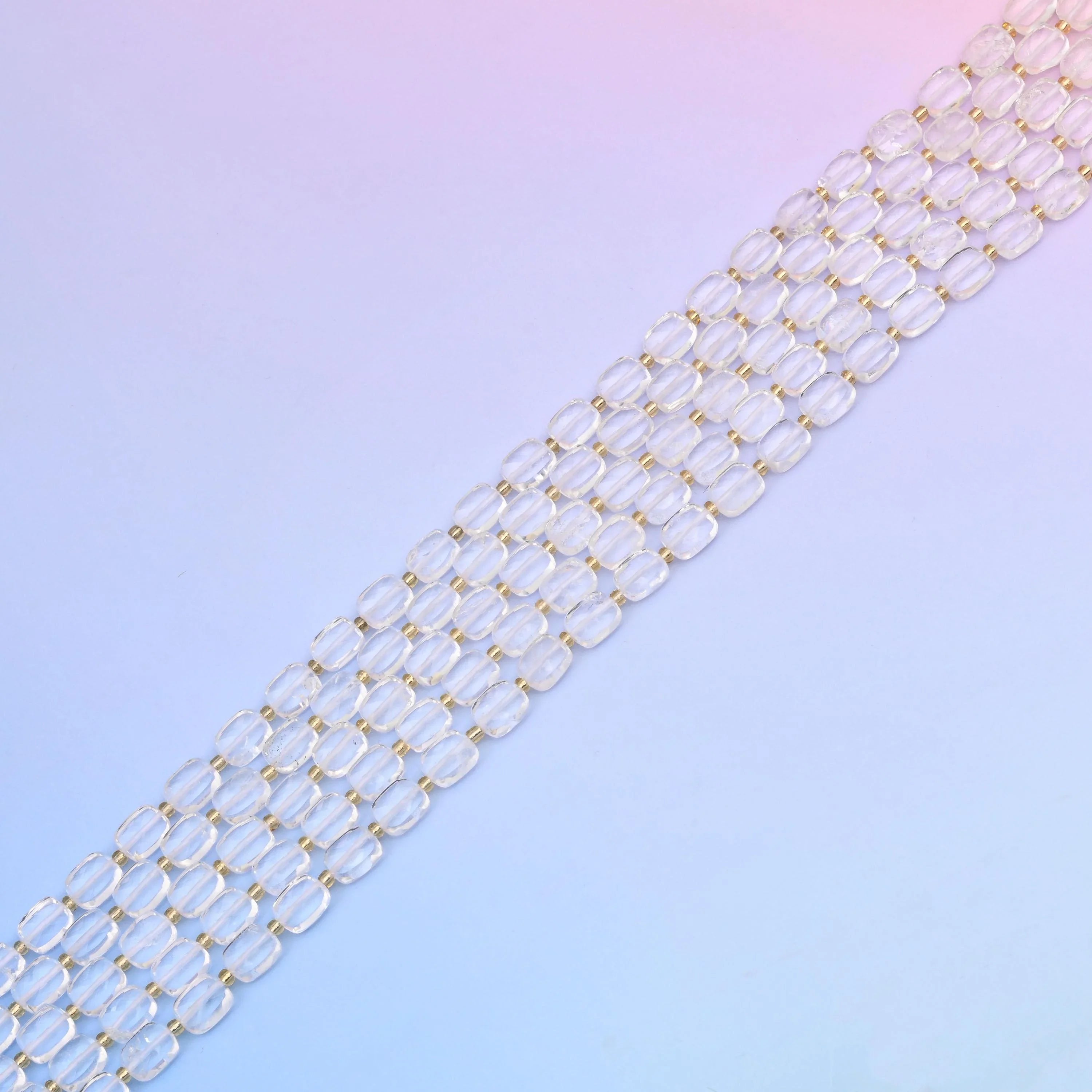 Clear quartz beads, almost water-clear and glass-bright