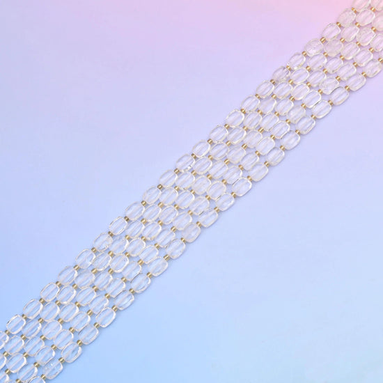 Clear quartz beads, almost water-clear and glass-bright