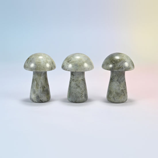 Three 2 inch gray labradorite mushroom crystal carvings, gray-green natural stone with a soft sheen