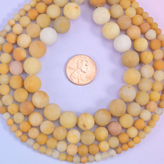 Yellow Jade Matte Round Beads, soft butter and honey yellow with occasional cream and pale apricot beads