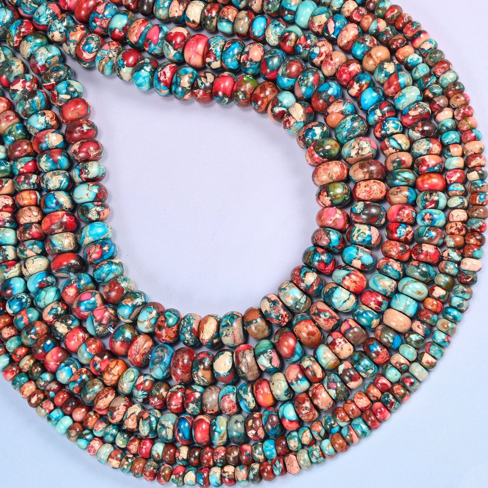 Red Dyed Sea Sediment Jasper Rondelle Beads with a 1.0mm to 1.2mm hole.