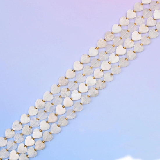 White moonstone beads with a cool blue-grey shimmer