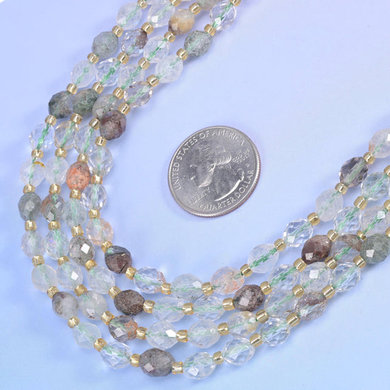 Green Phantom Quartz Faceted Rice Barrel Beads in clear to milky quartz with soft green inclusions