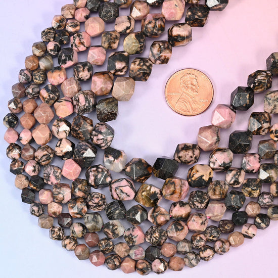 Faceted diamond star cut black line rhodonite beads