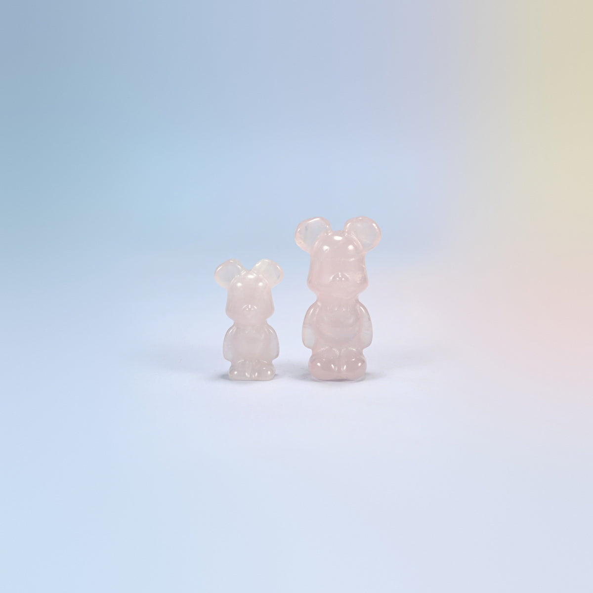 A 1.5 inch and a 2 inch rose quartz power bear crystal carving, light pink natural stone