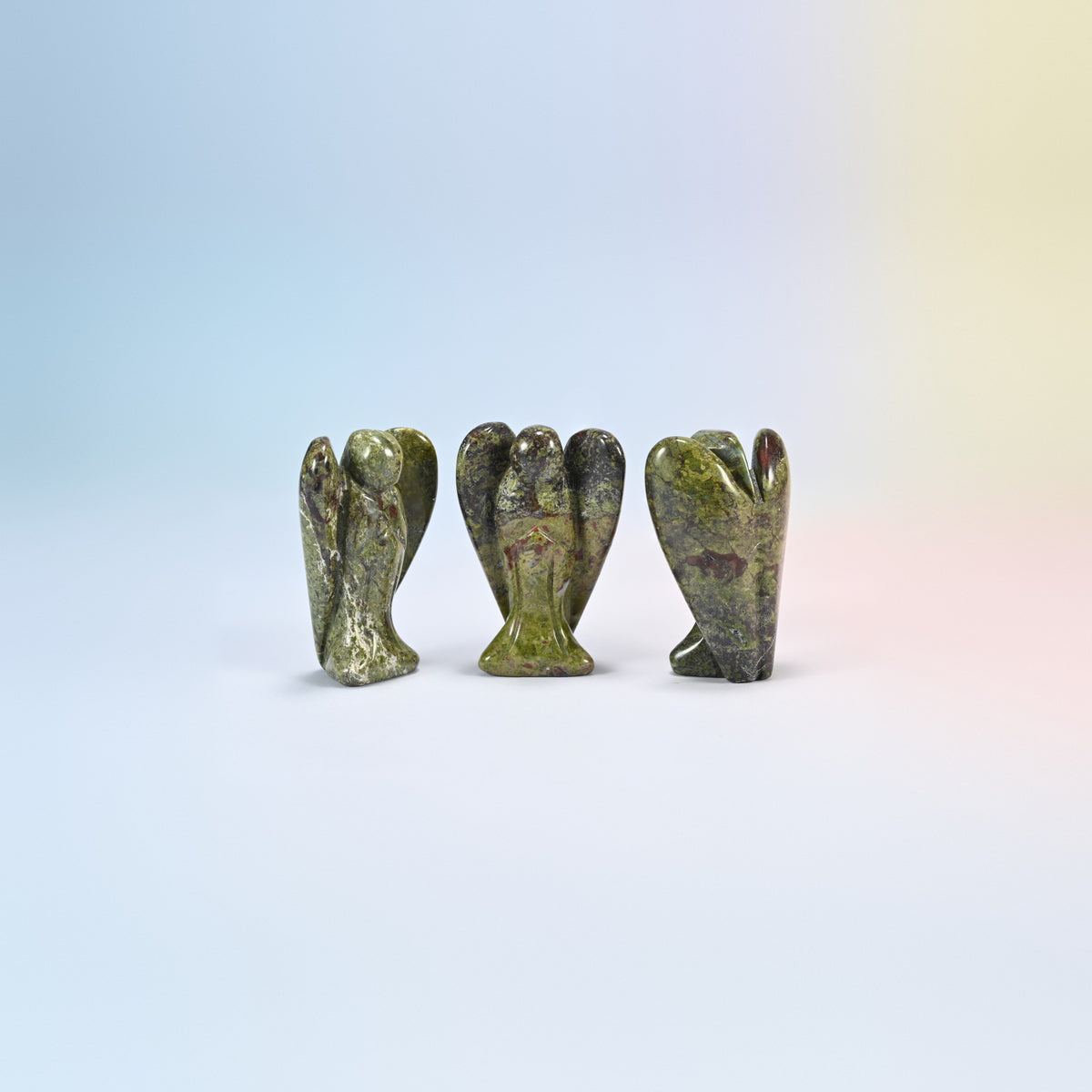 Three natural dragon bloodstone guardian angel carvings, olive green with red patches, 2 inch