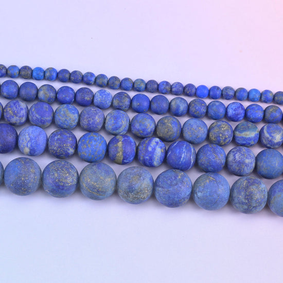 Lapis lazuli round beads in deep denim blue