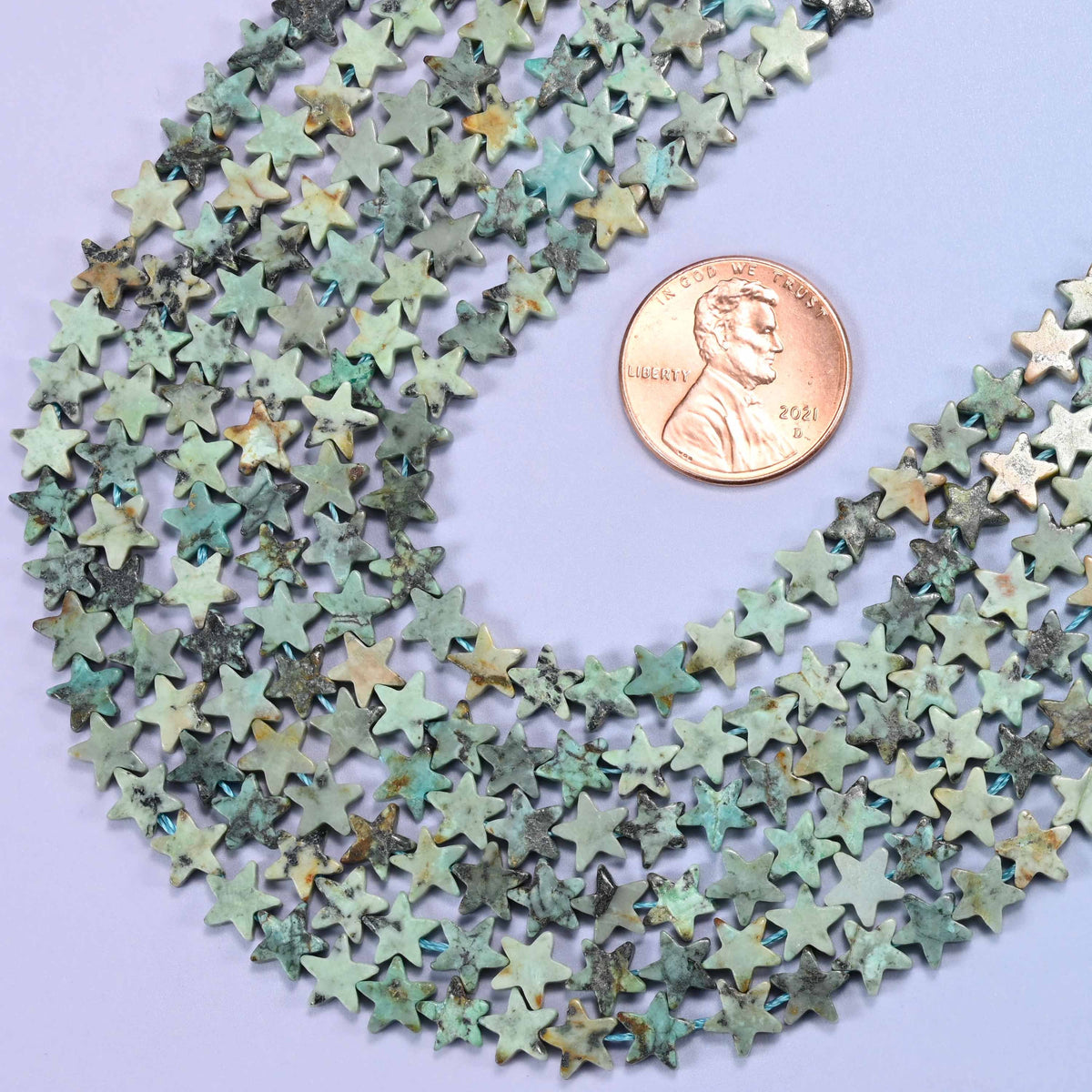 Flat five-pointed star cut african howlite beads