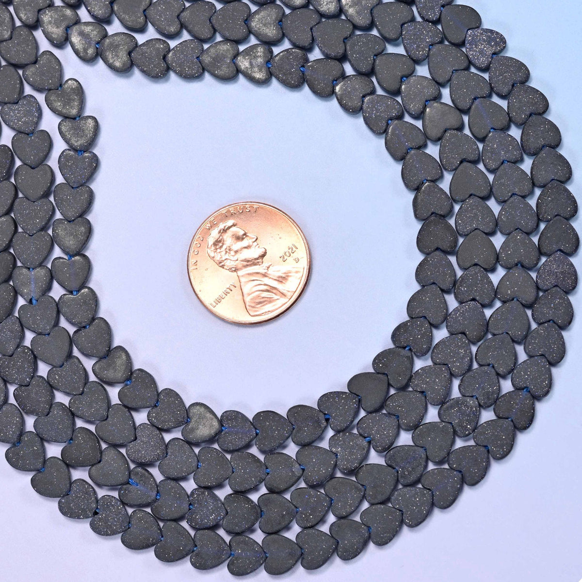Matte Blue Sandstone Flat Heart Beads, man-made glass with deep midnight navy color and faint blue glitter
