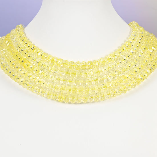 Transparent yellow glass beads, faceted rondelle shape, 5x8mm