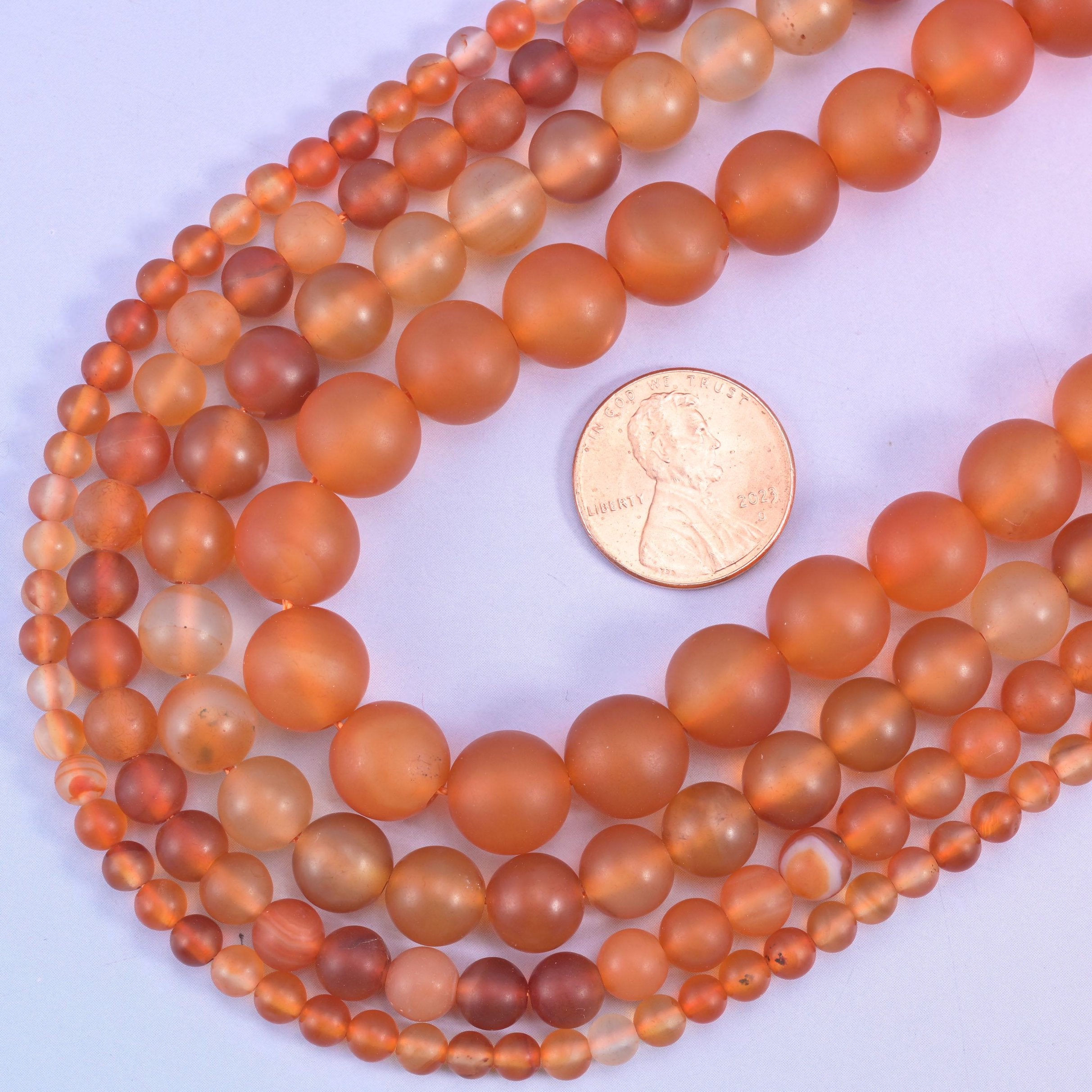 Orange Carnelian round beads, 15 inch strand