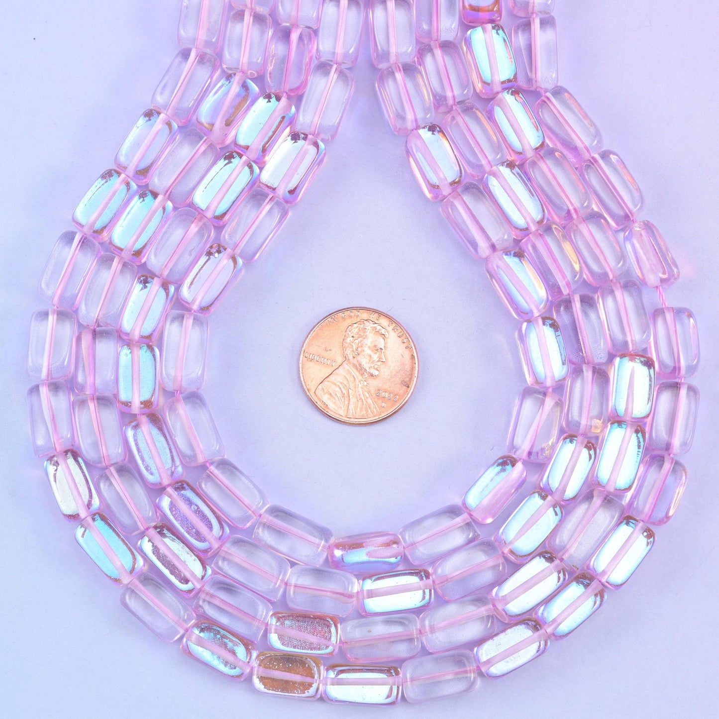 Light purple mystic aura rectangle glass beads, glossy transparent finish with soft lilac-pink shine