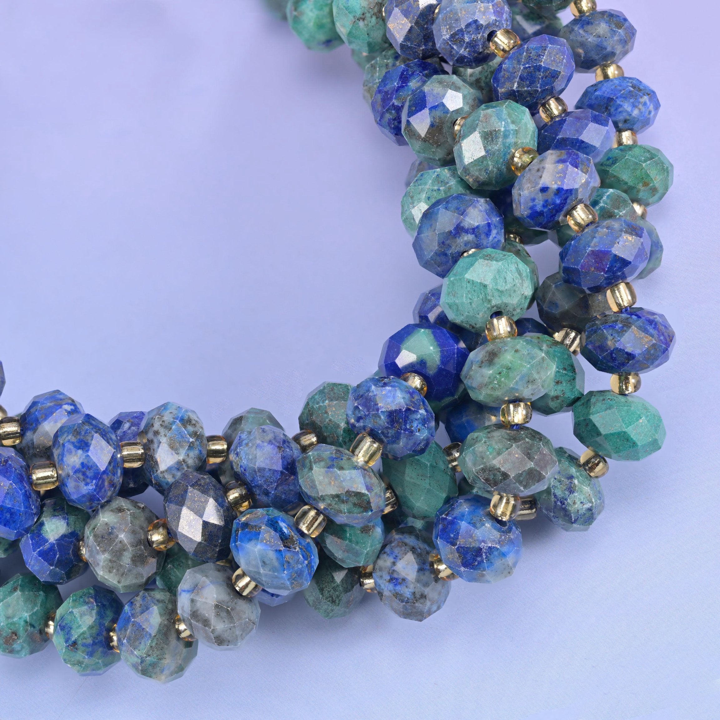 Faceted rondelle cut phoenix lapis beads