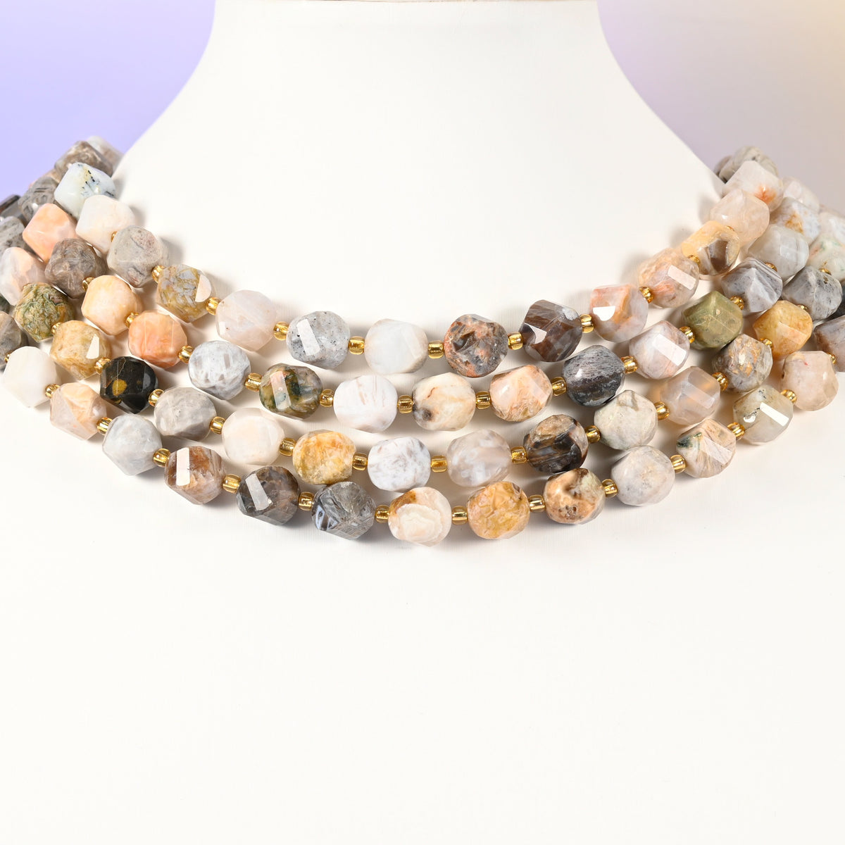 Bamboo Agate natural stone beads showing fine plant-like inclusions inside several of the 10mm faceted beads