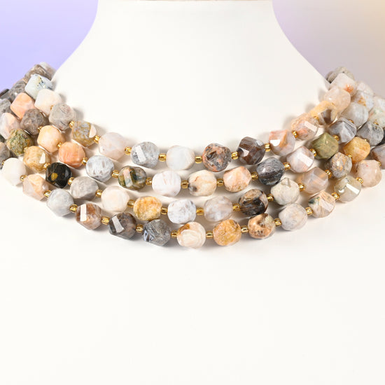 Bamboo Agate natural stone beads showing fine plant-like inclusions inside several of the 10mm faceted beads