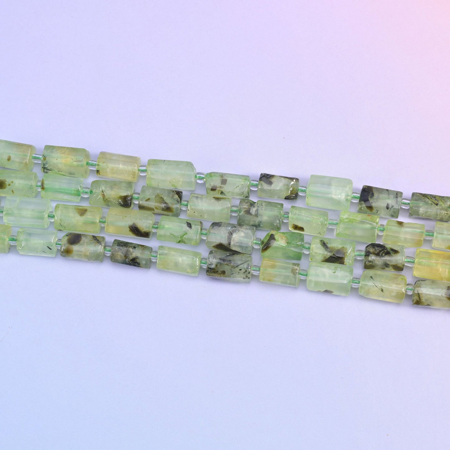 Prehnite faceted tube beads with white and translucent streaks
