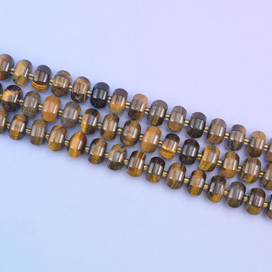 Tiger eye beads in golden-brown bands with a signature chatoyant shimmer