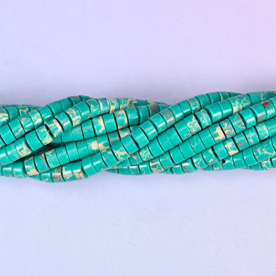 Green Shoushan Stone smooth heishi disc beads (dyed) in turquoise-green with cream and rust mottling, finished with a polished, sophisticated look.
