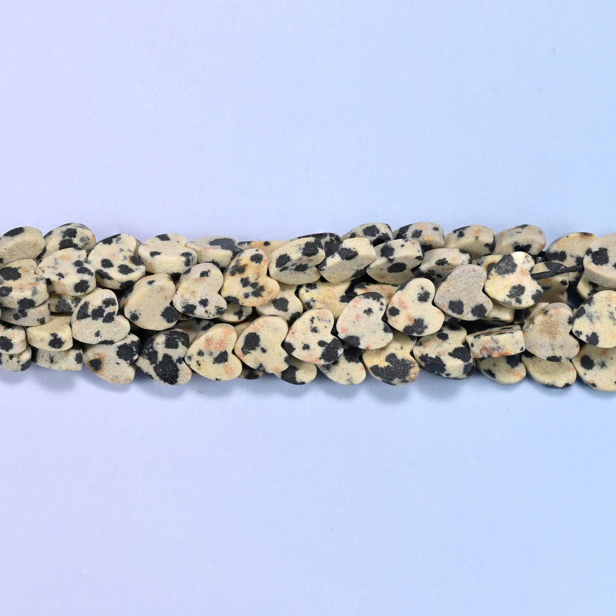 Matte dalmatian jasper flat heart beads, approximately 68 per strand