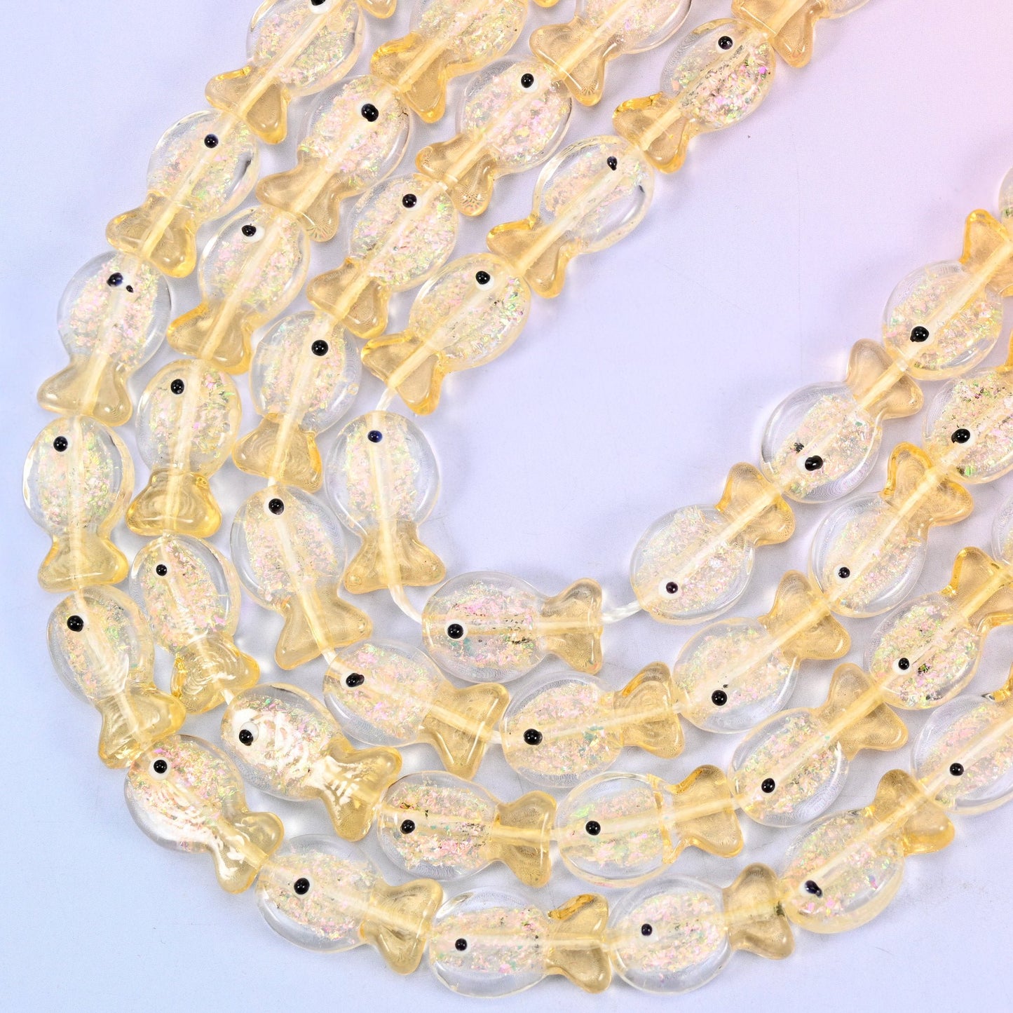 Iridescent Yellow Fish Glass Beads, 15.5 inch strand