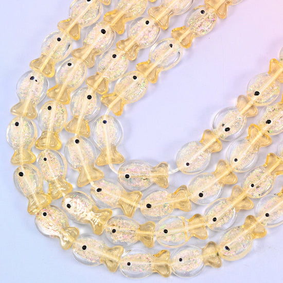 Iridescent Yellow Fish Glass Beads, 15.5 inch strand