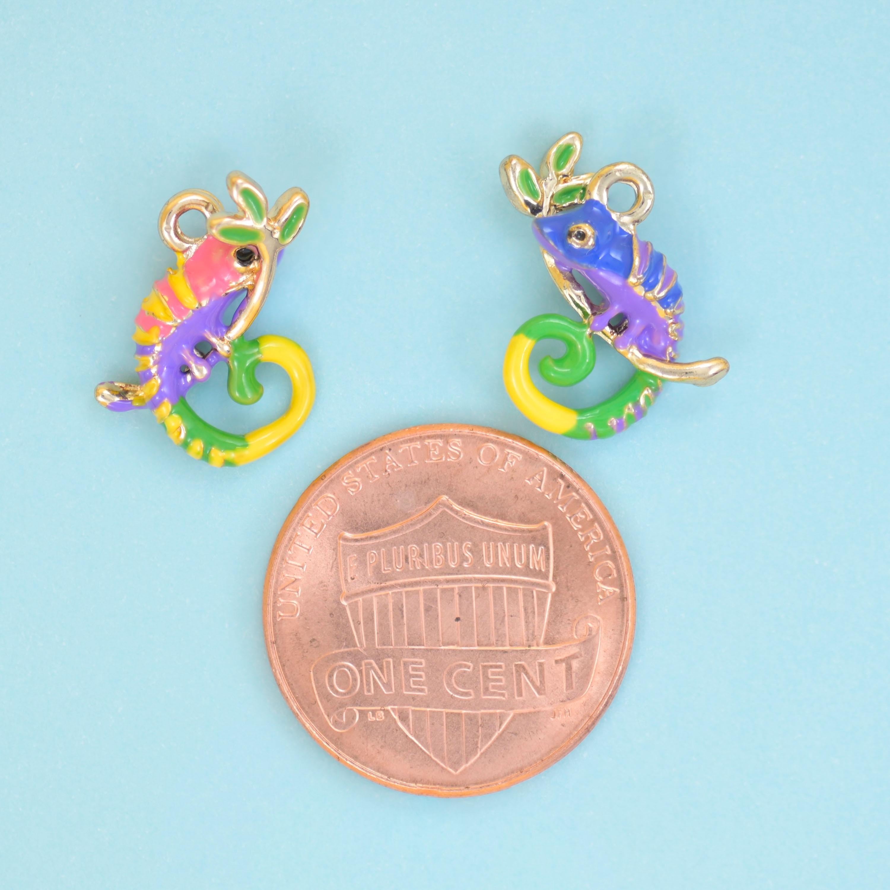 A little chameleon with its tail curled into a spiral, painted in violet, coral pink, lime green and sunny yellow enamel…