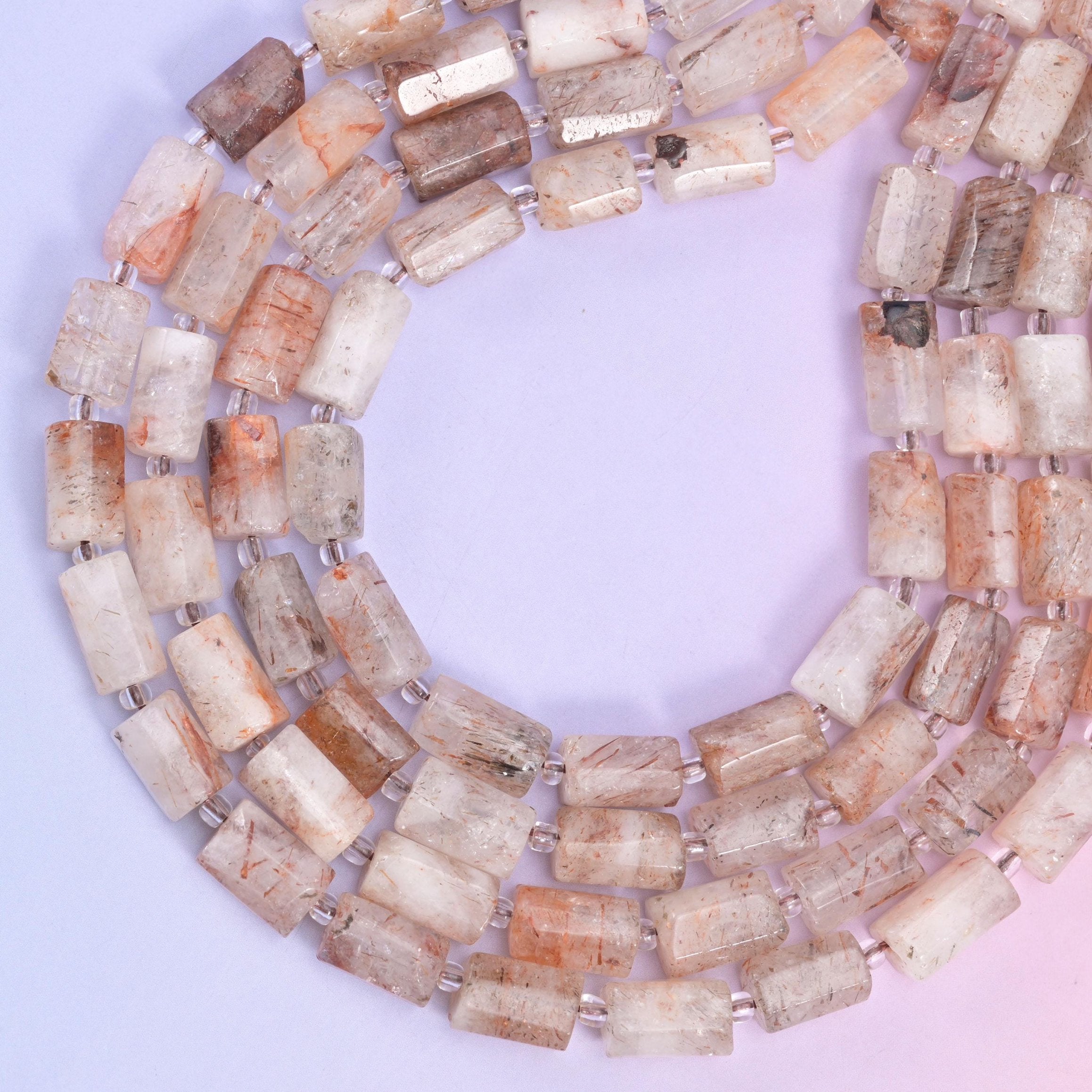 Red Copper Rutilated Quartz tube beads, approximately 29 beads per strand