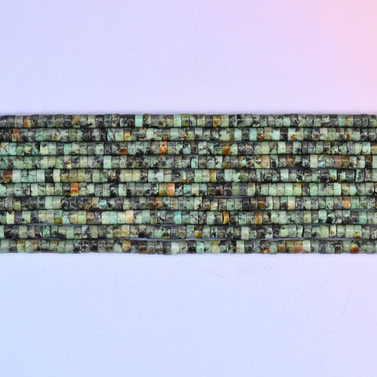African Howlite Smooth Heishi Disc Beads in mottled green with black matrix veining