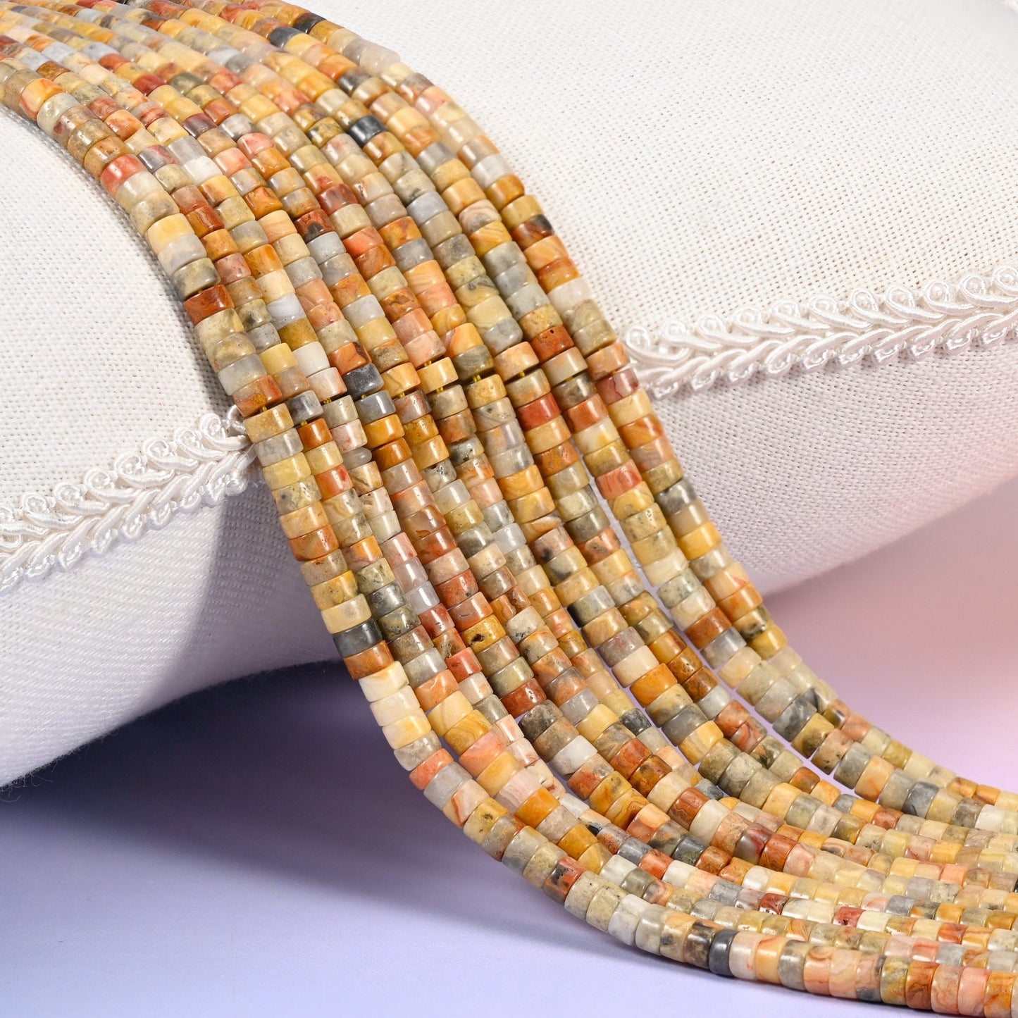 Natural Crazy Agate smooth heishi disc beads in a warm mix of amber, rust, cream and gray