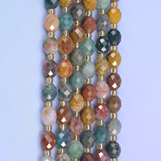 Faceted rice barrel cut ocean agate beads