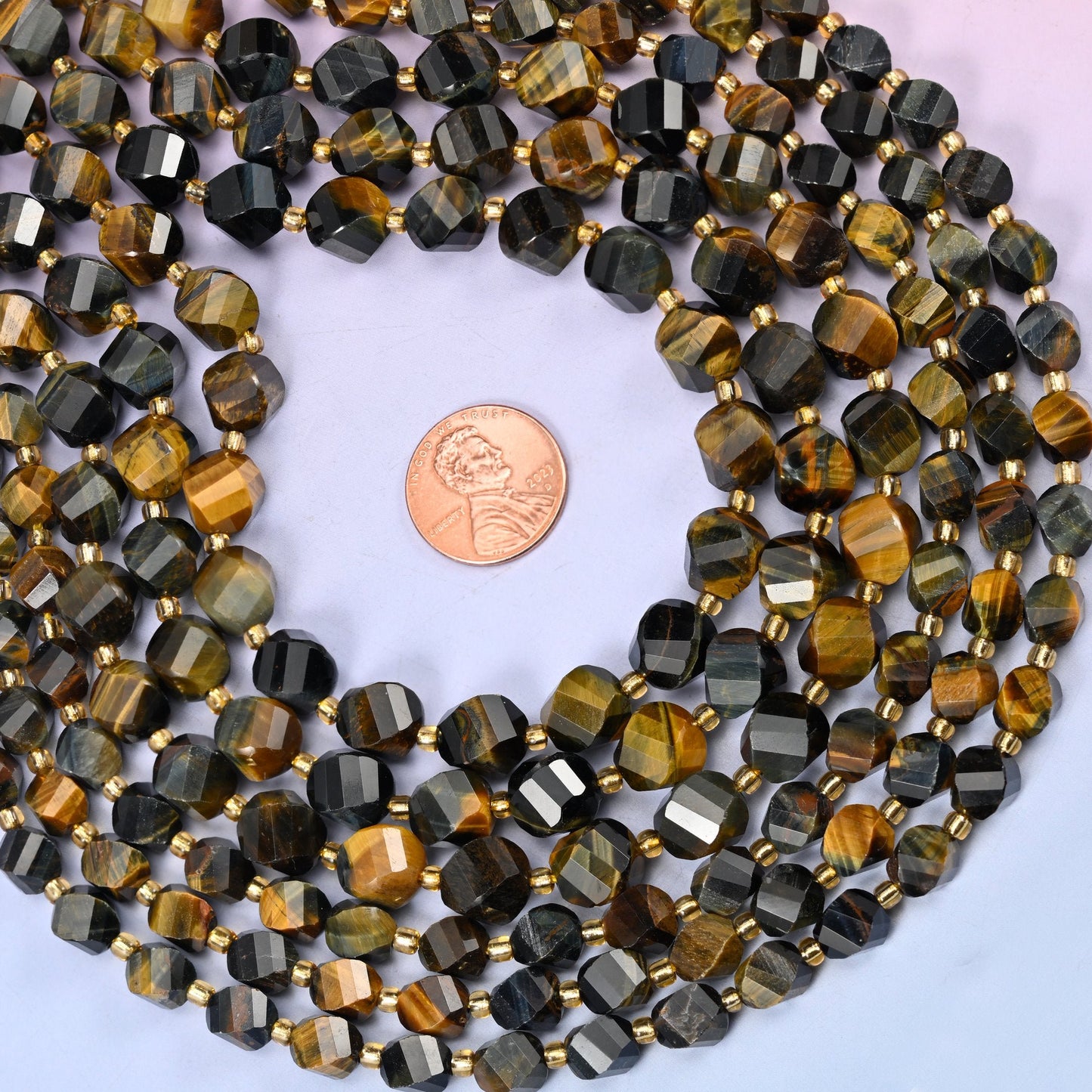 Natural Iron Tiger Eye with gold-tone spacers between beads