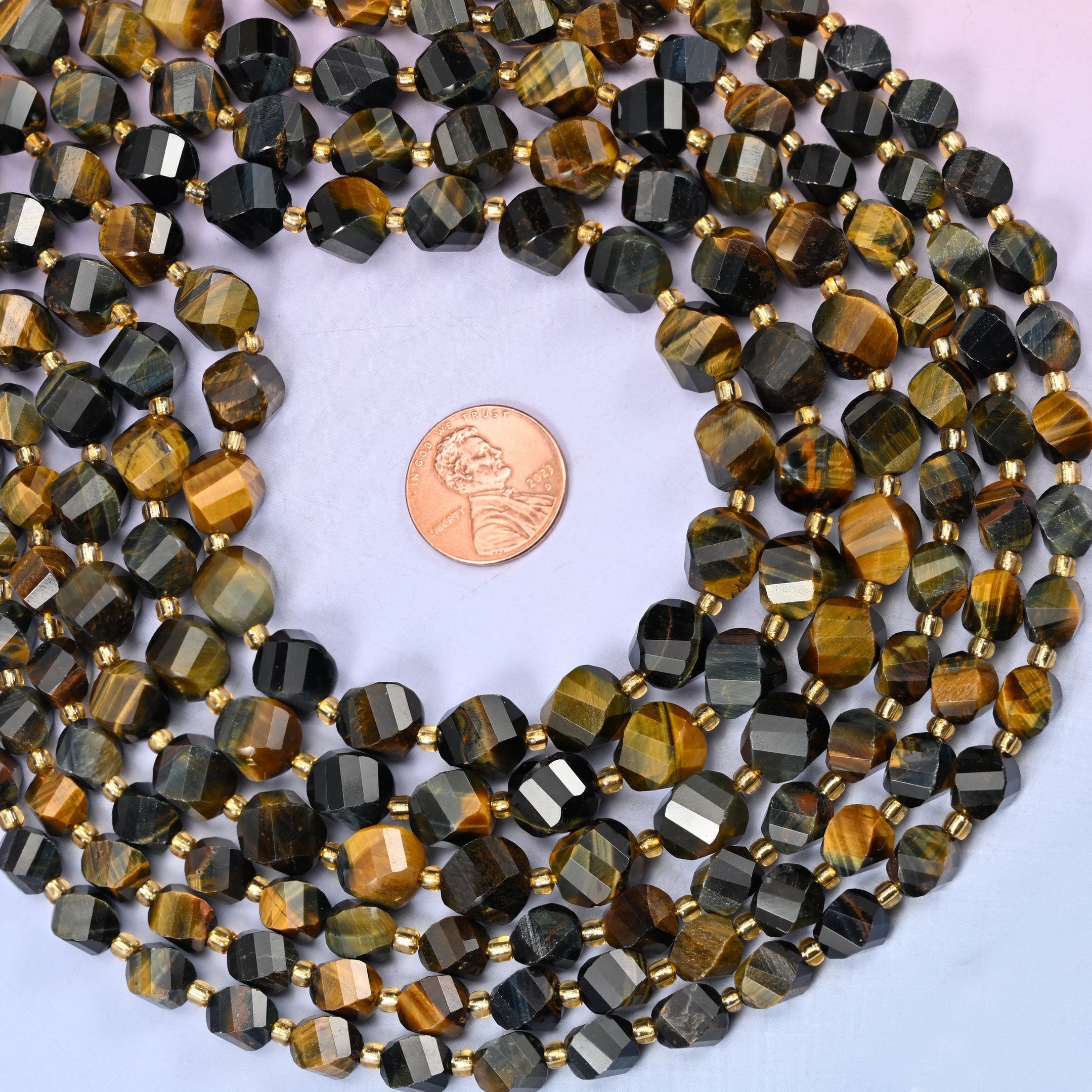 Natural Iron Tiger Eye with gold-tone spacers between beads