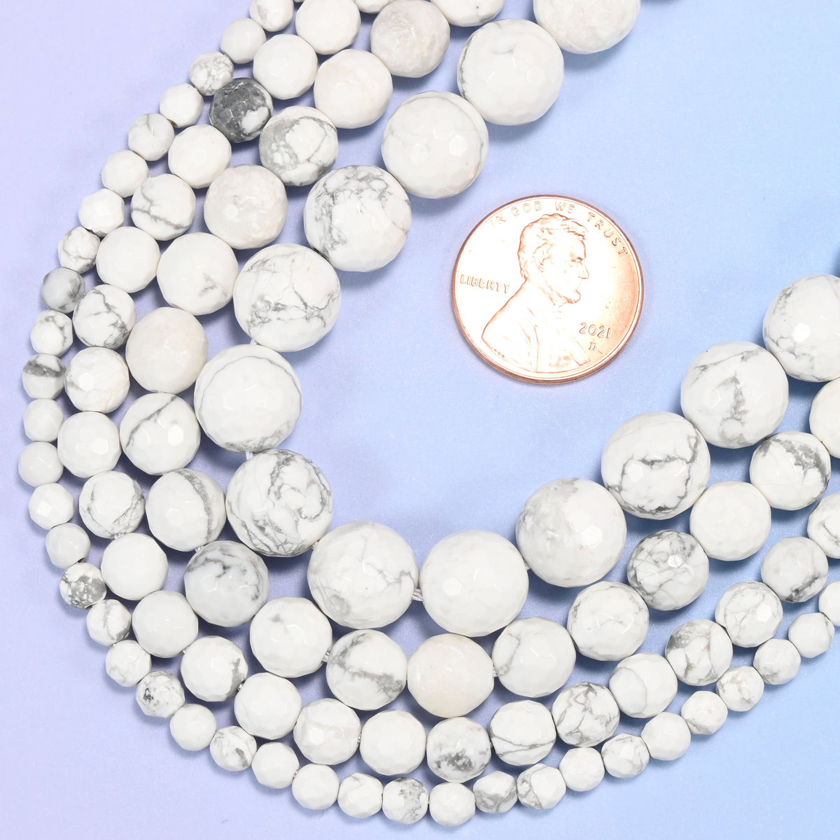 Faceted round cut white howlite beads