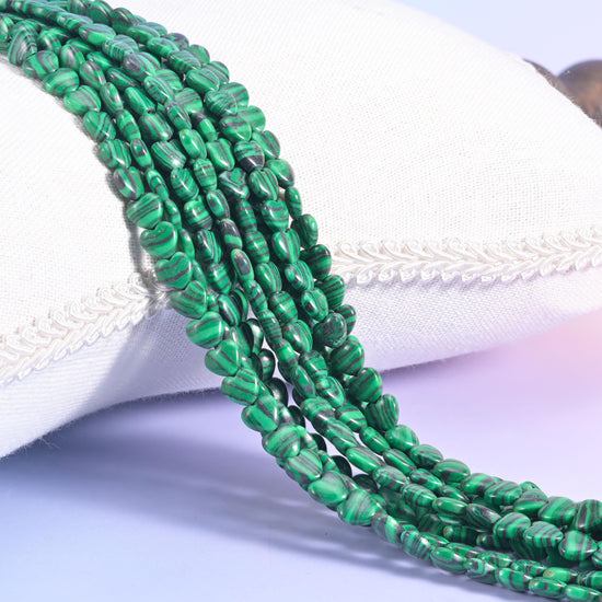 Green Malachite Heart Beads, vivid grass green ringed with pale mint and near-black bands
