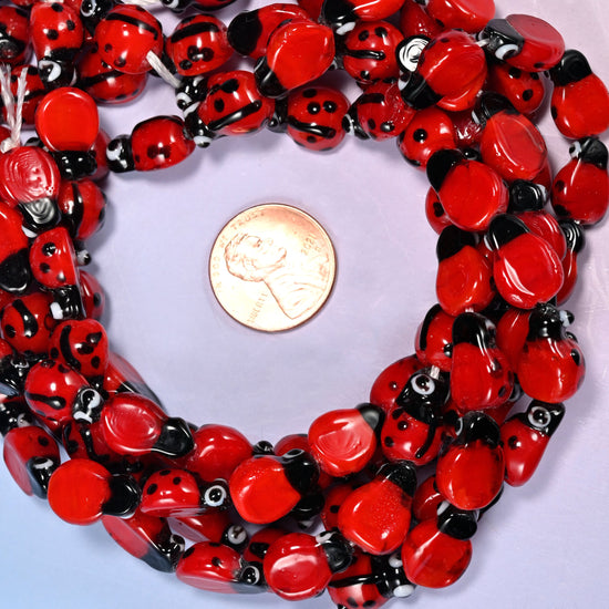 Red Ladybug Glass Beads Size 13.40x9.60mm, 10 Inch Strand.